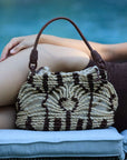 Close up image of The Rope Tote - Jute tote bag handwoven from rope in mini size with drawstring pouch