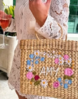 Customizable POOLSIDE × Over The Moon straw tote carried for bridal event
