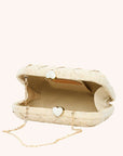 Interior of straw clutch woven with lurex and heart shell clasp – The Love Heart Clutch