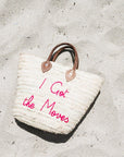 Medium straw beach tote bag on the sand – The Medium Beach Tote