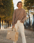 The Teddy Tote sherpa tote bag styled for winter