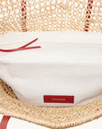 Interior detail of large open weave beach tote bag with double shoulder straps