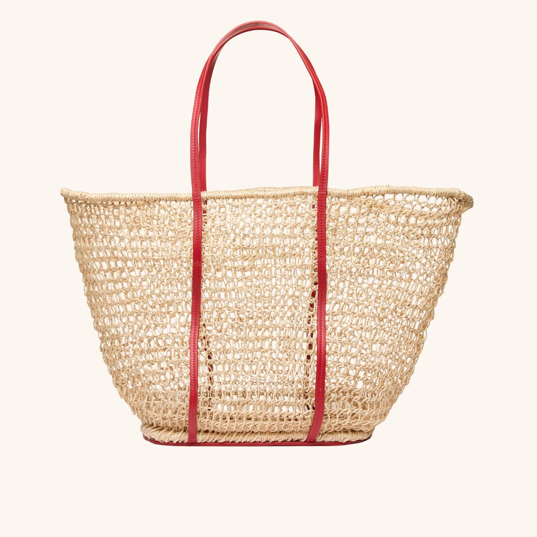 Detailed view of large open weave beach tote bag with double shoulder straps