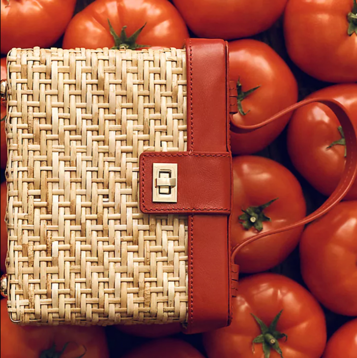 Rattan vanity case in front of tomatoes