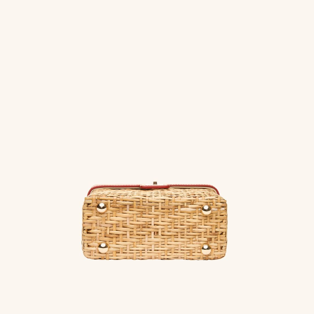 The bottom view of The Box Bag Vanity Case with red leather top