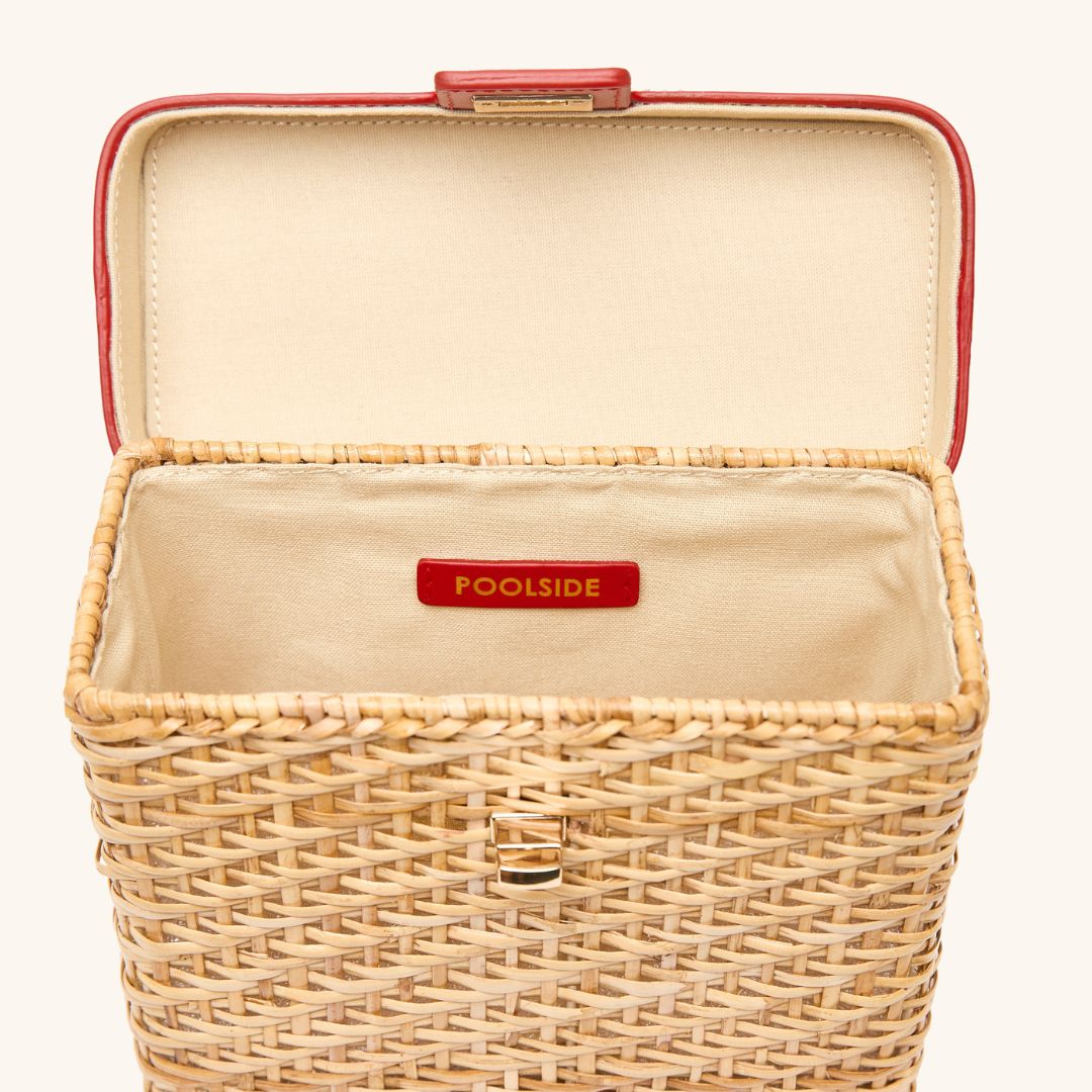 The inside view of The Box Bag Vanity Case with red leather top
