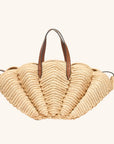 Raffia shell tote bag designed for beach vacations and summer travel