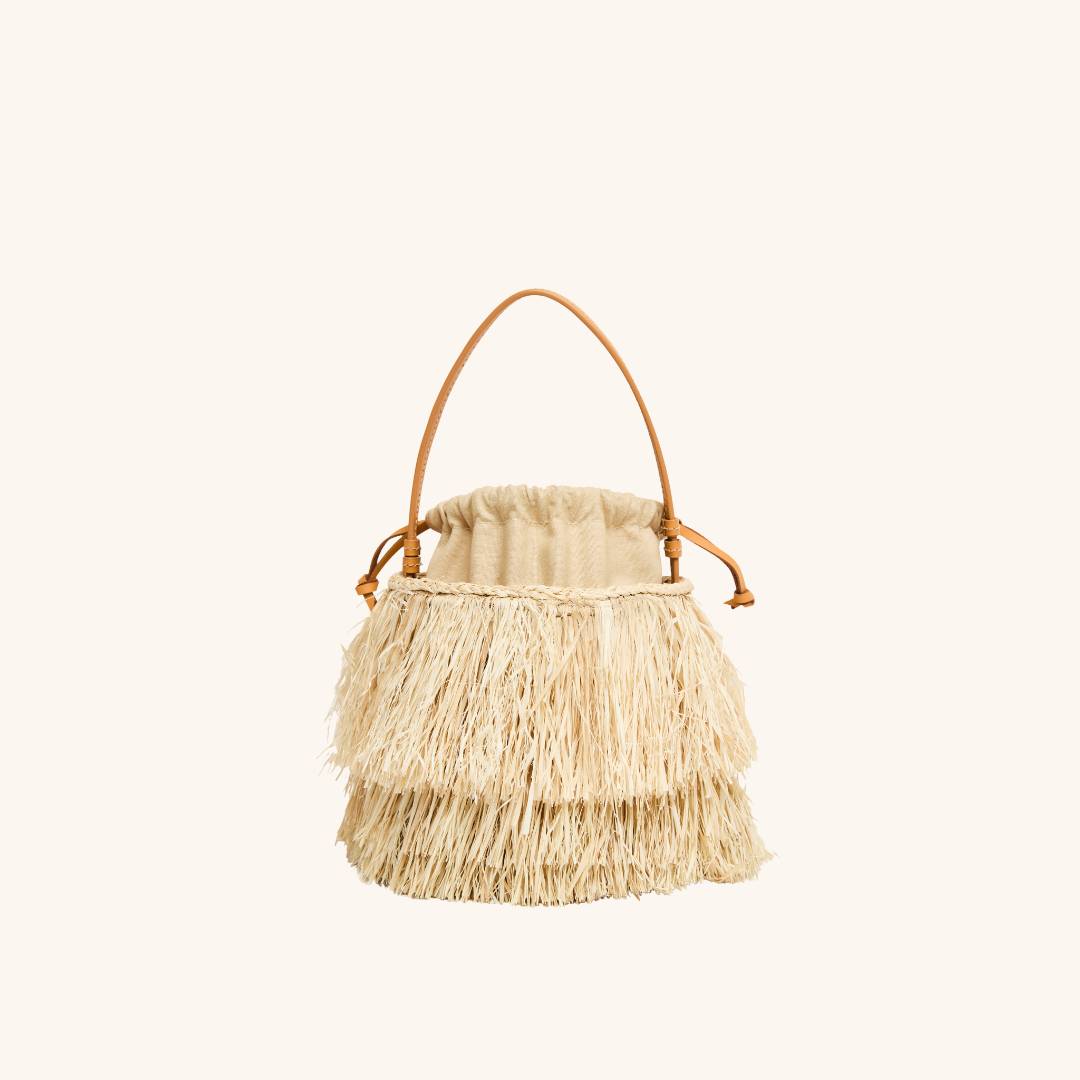 Handwoven raffia bucket bag with leather trim — summer vacation handbag