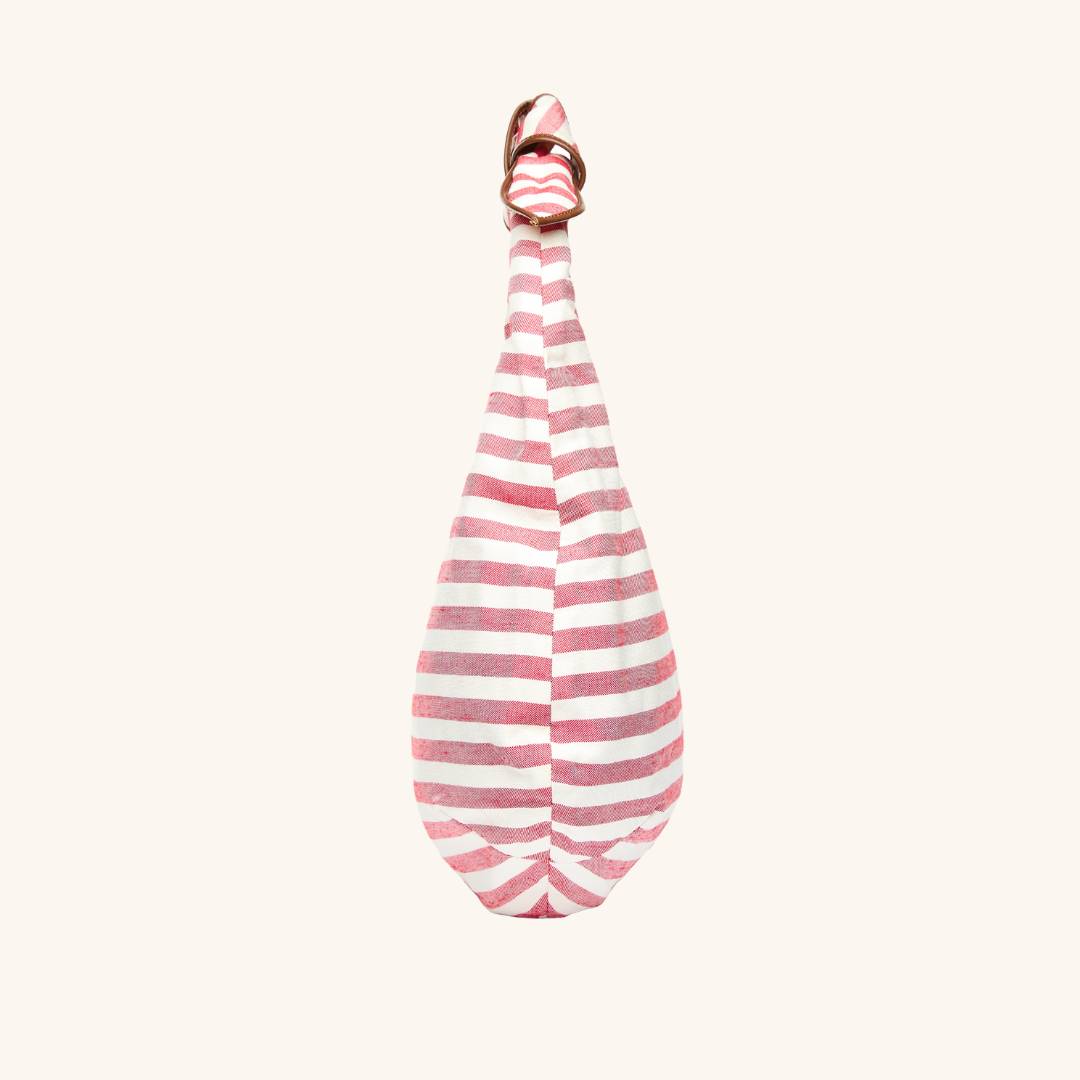Side view - The Josie Knot Bag - Red striped tote bag with structured shape and leather trim