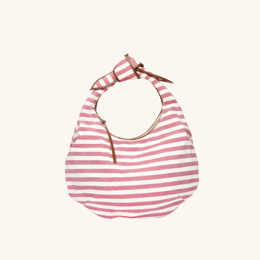 Red and white striped canvas tote bag with leather trim