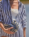 Close-up of The Anna Clutch - nautilus shell clutch