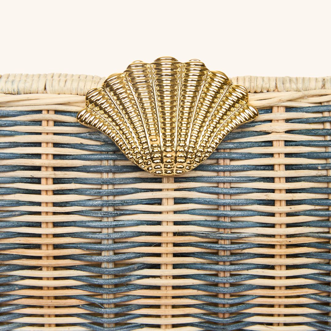 Clasp detail on rattan clutch with gold seashell clasp 
