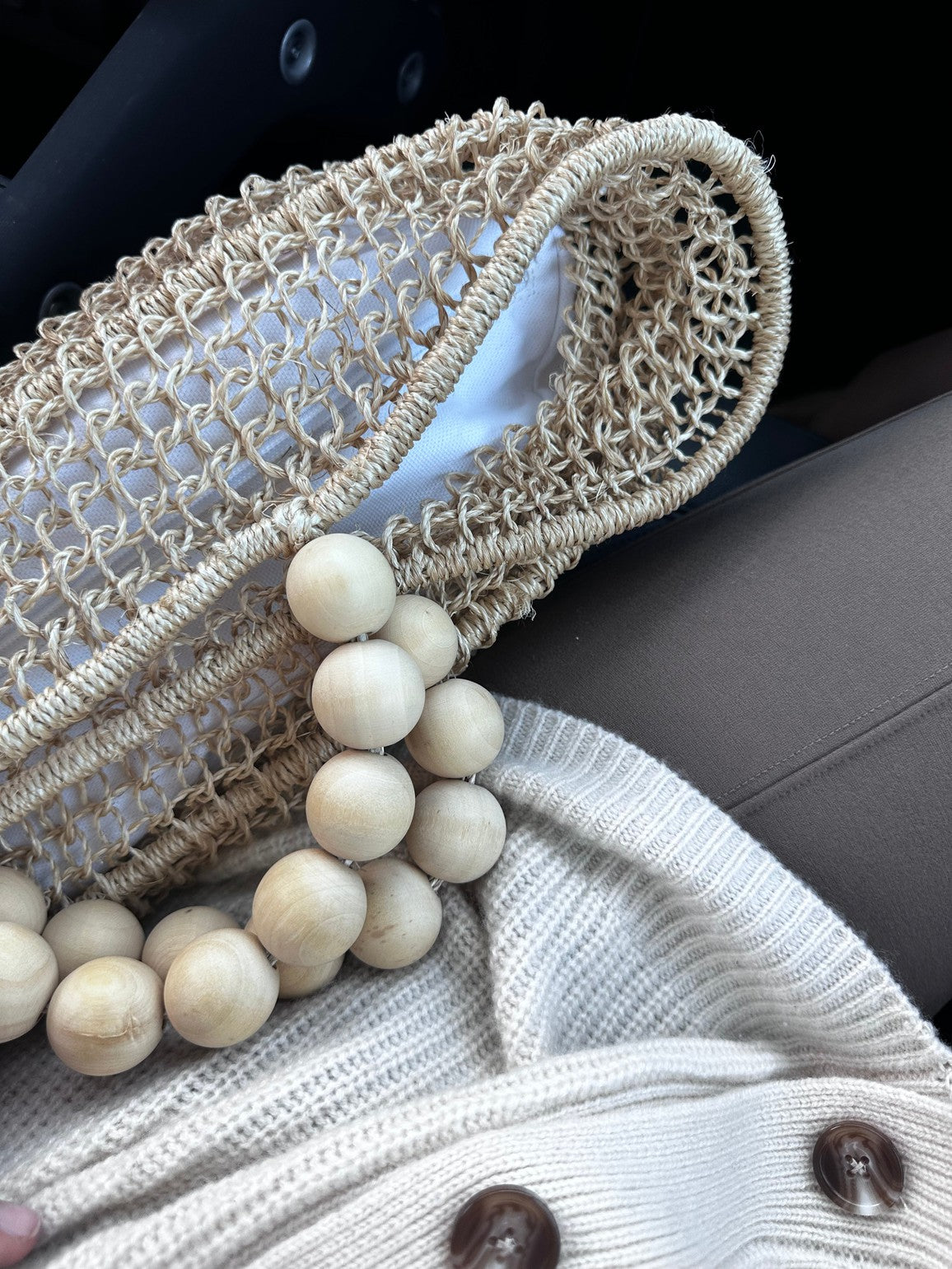 Ball bracelet handle detail on The Comporta Tote