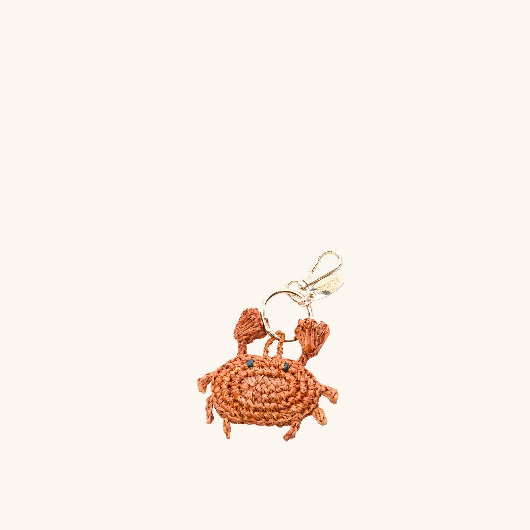 Hand-crocheted raffia crab bag charm with goldtone hardware – The Crab Bag Charm