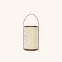 Woven straw cylinder bag with leather trim – The Cylinder