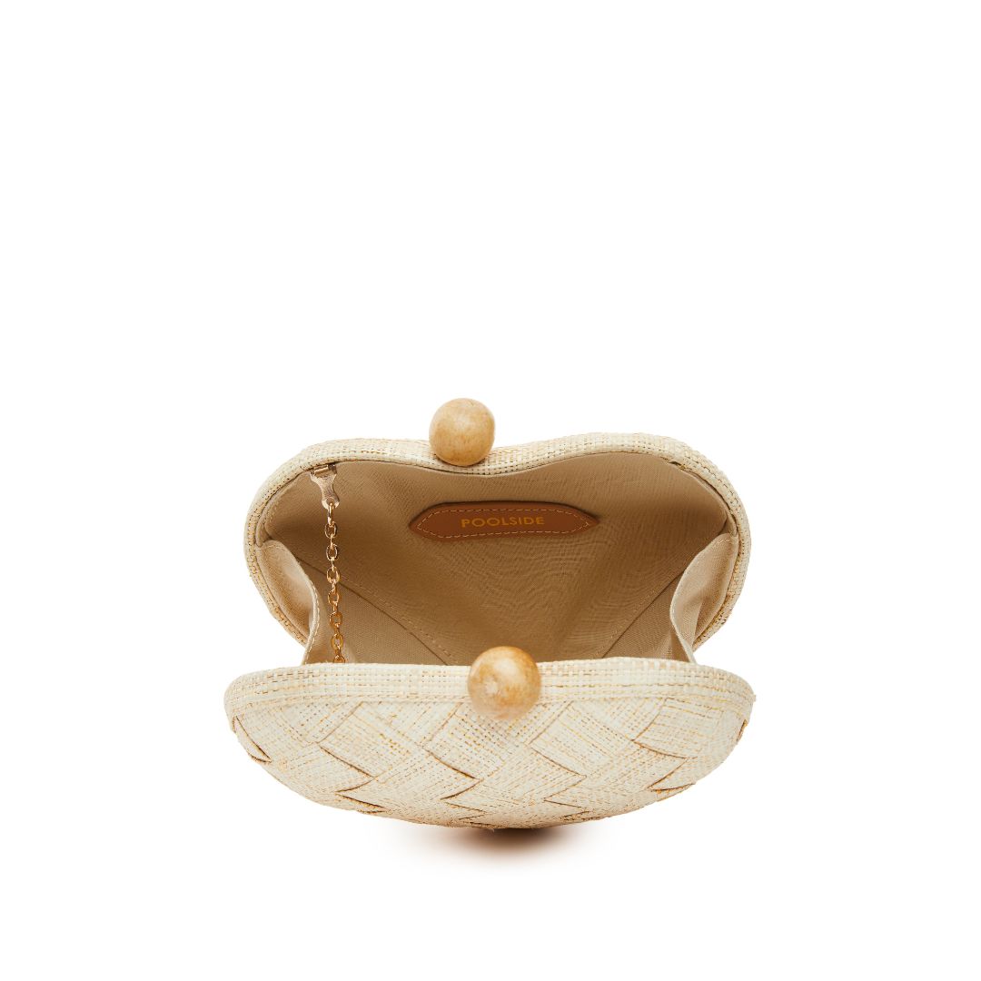 Interior of The Di Mezzo Clutch worn with optional chain strap