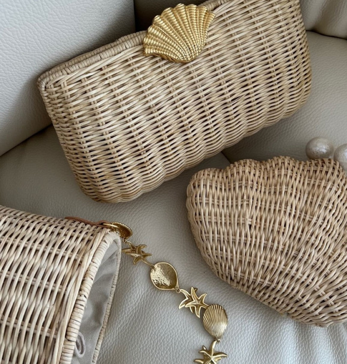 Multiple bags styled together with jewelry accents