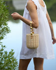 The Island Bucket Bag worn with summer dress