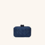 Woven straw clutch in navy with chain strap – The Island Clutch