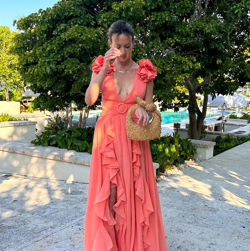 The Josie Knot Bag worn as a wristlet