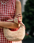 The Josie Knot Bag worn on the wrist