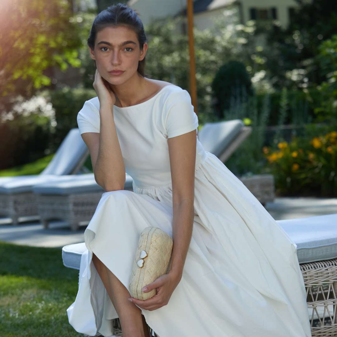 Straw clutch woven with lurex and heart shell clasp – The Love Heart Clutch