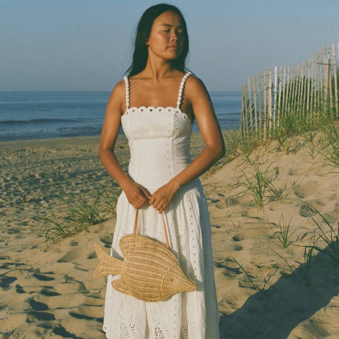 The Paros Tote worn with a white dress