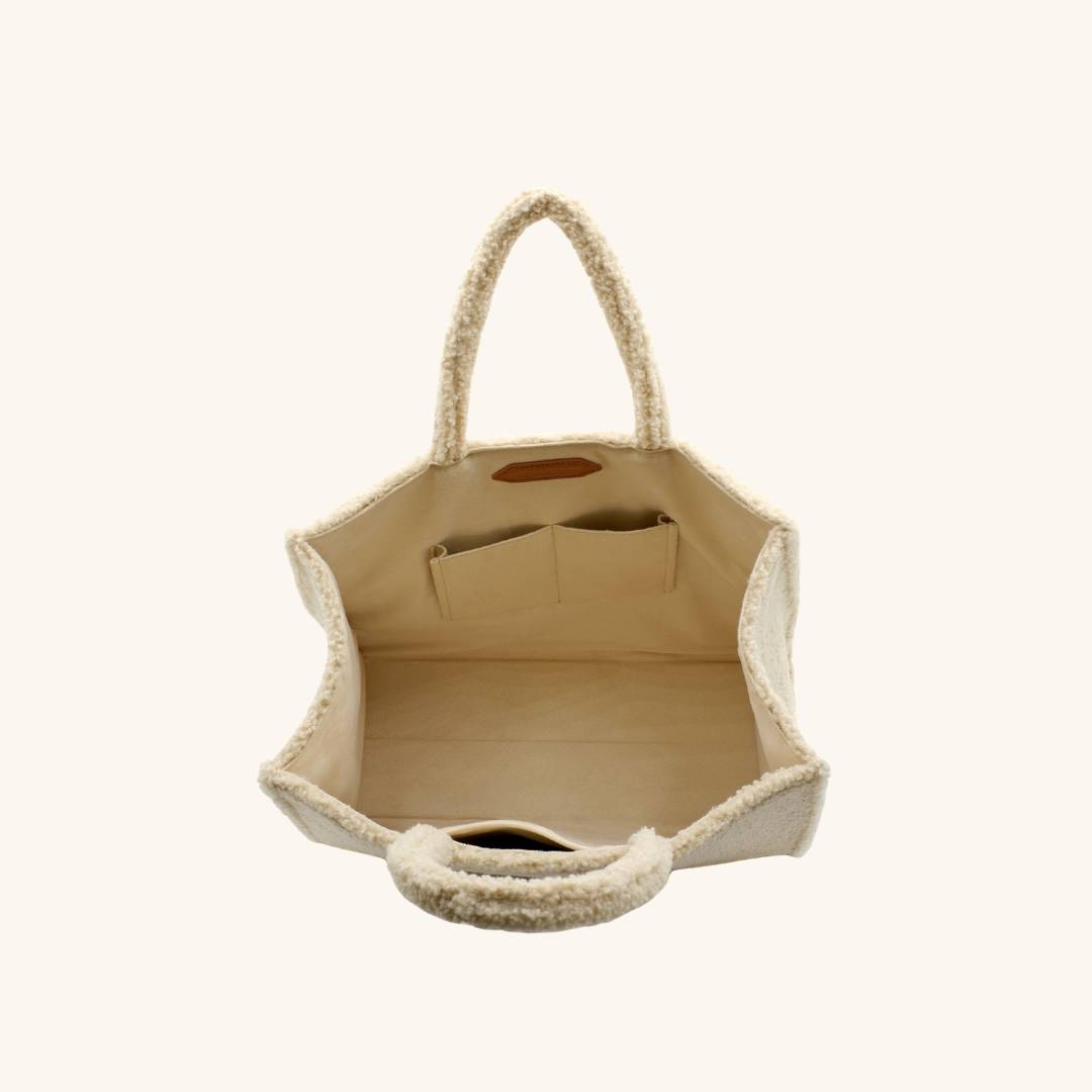 Interior of The Teddy Tote sherpa tote bag with pockets