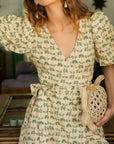 Rattan tortoise clutch worn as a clutch