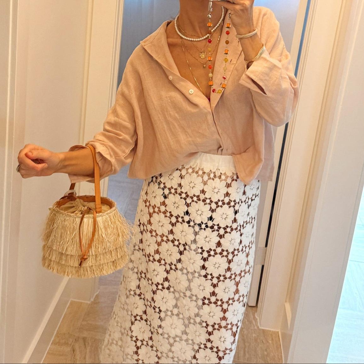 White lace cover up skirt styled for summer vacation and beachwear