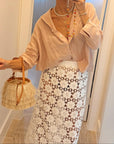 White lace cover up skirt styled for summer vacation and beachwear