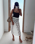 White cotton lace midi skirt with floral crochet design and elastic waist